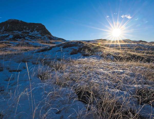 Prairie Wind and Silver Sage Limited Edition 2023 calendar - Low Winter Sun in Grasslands National Park, December - Photo by James R. Page